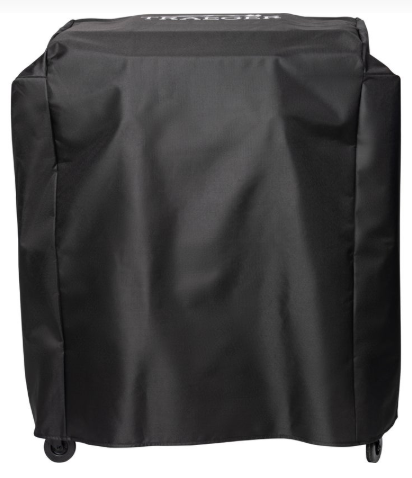 Black grill cover with Traeger branding on a white background