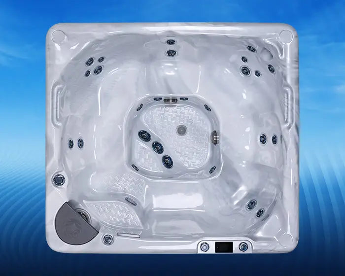 Top view of a hot tub with a blue gradient background