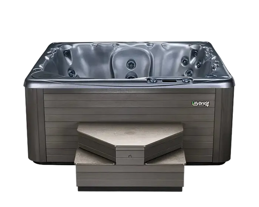 Hot tub with steps, featuring the 'Hybrid' brand.
