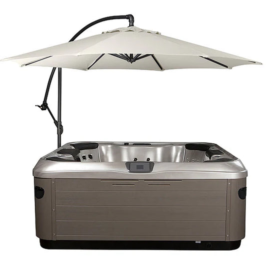 Hot tub with a beige umbrella on a white background