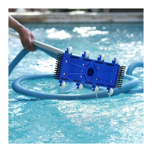 Blue pool cleaning tool being used in a swimming pool