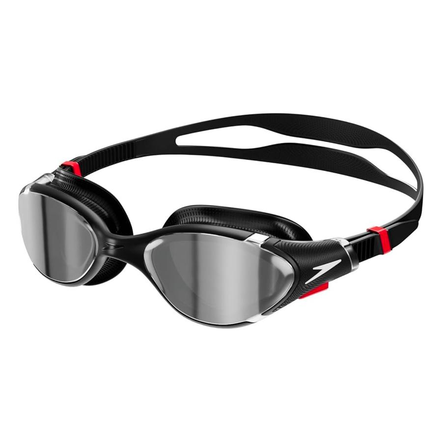 Black and red swim goggles on a white background